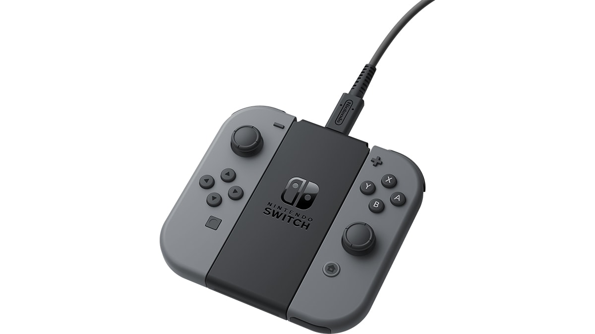 Nintendo joy-con charging stand (two-way) z nameščenimi joy-con kontrolerji od blizu