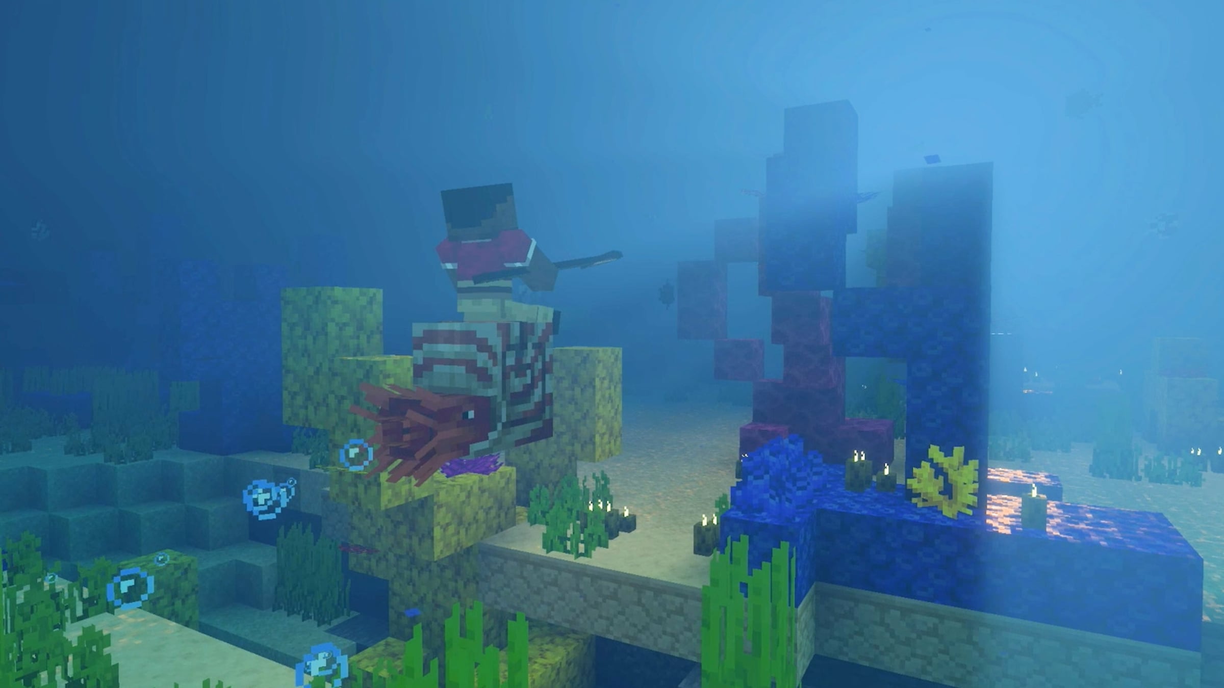 A Minecraft player exploring a decorated underwater coral reef build