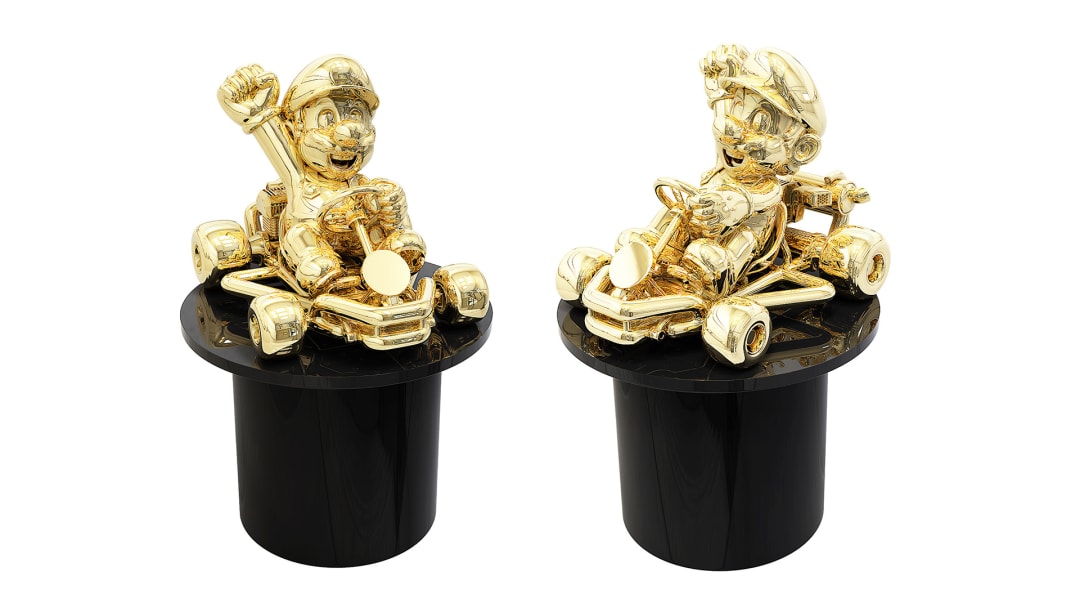 The Grand Prize trophy depicts a golden Mario cheering in his kart.