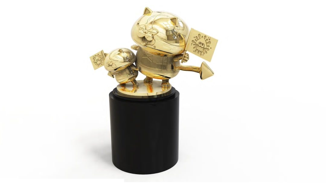 The Grand Prize trophy depicts golden Judd and Li'l Judd characters holding up their flags.