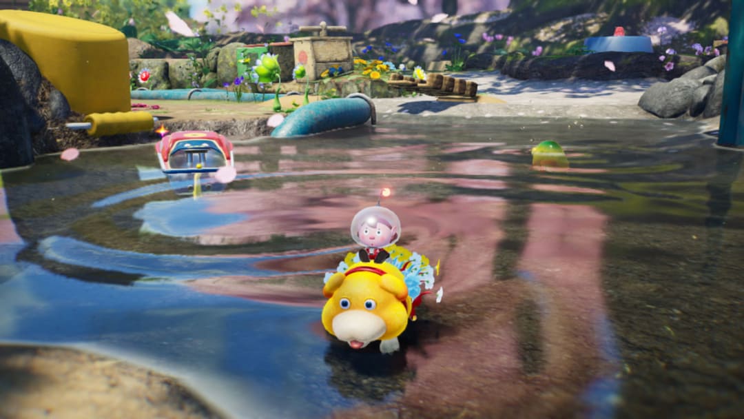 Oatchi gives the Explorer and Pikmin a ride on his back across water.
