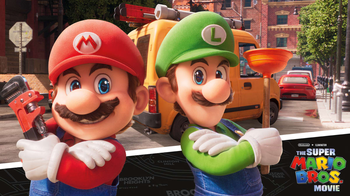 This screenshot of the Super Mario Bros. Movie shows Mario and Luigi standing back to back in front of their plumbing van.