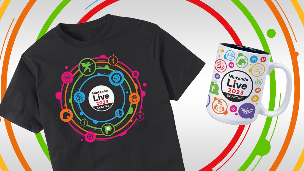 A black t-shirt and a white mug, each featuring the Nintendo Live 2023 logo surrounded by colorful circles, with symbols and characters from Nintendo’s games.