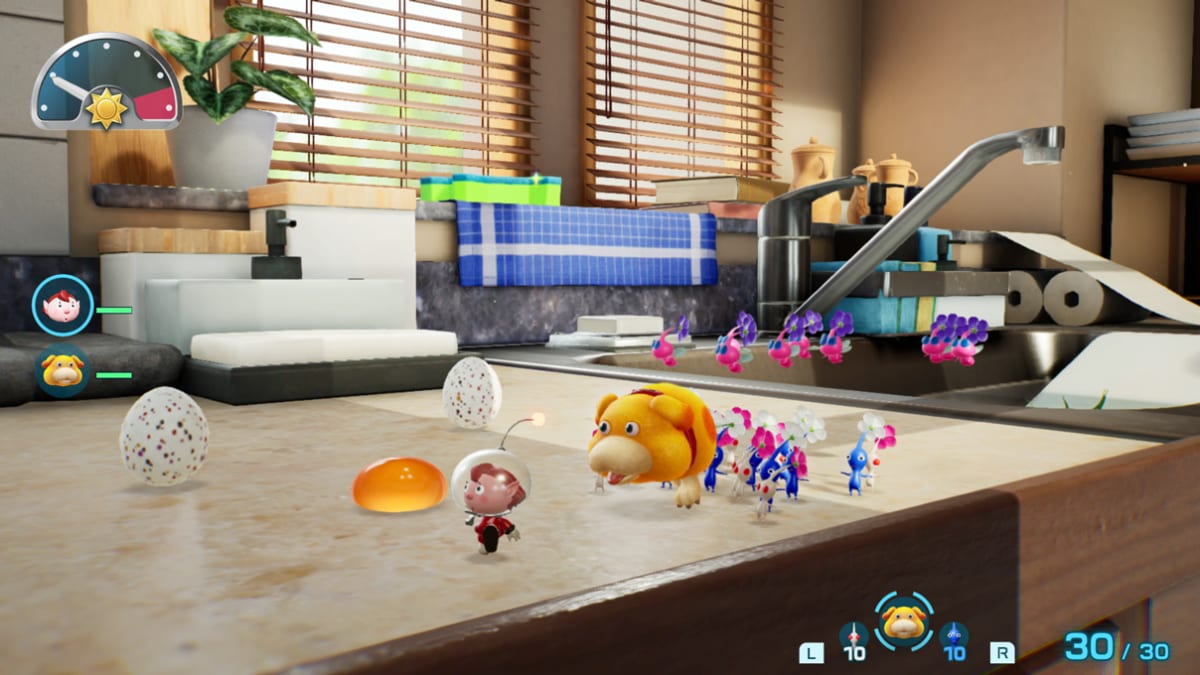 An Explorer leads Oatchi and the Pikmin across what looks like a kitchen countertop.