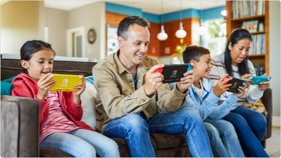 Family playing on their Nintendo Switch Consoles