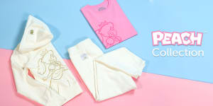 Peach merchandise collection with bubblegum pink and blue background