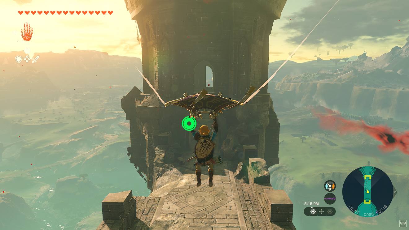 Link is flying though the air on a glider, about to land on a stone tower. 