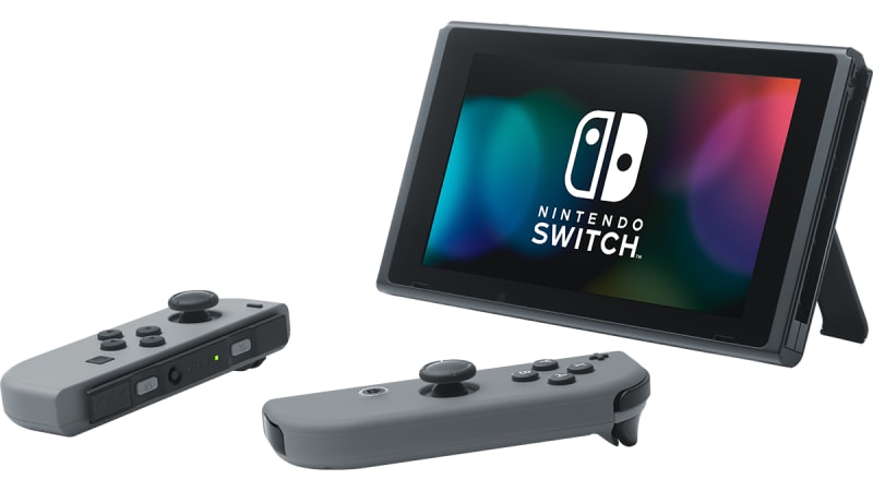 Nintendo Switch in Gray with Super Smash Bros and Accessories Kit 