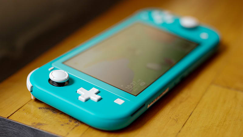 Nintendo switch lite coral sale store