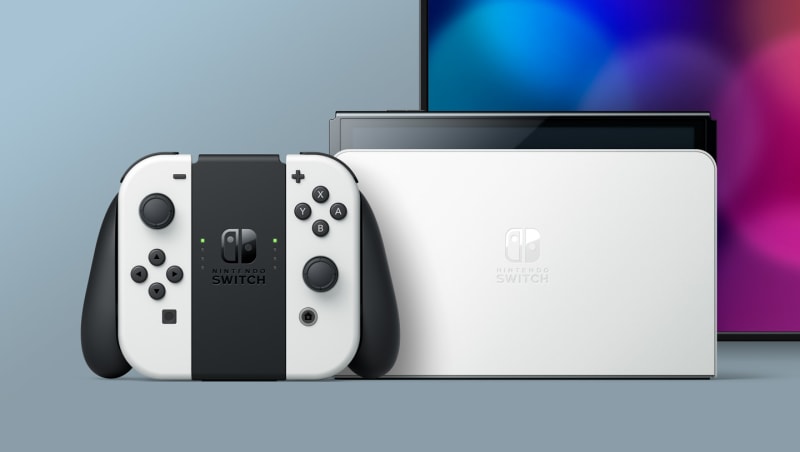 Nintendo Switch™ - OLED Model with White Joy-Con: Nintendo Switch: Video  Games 