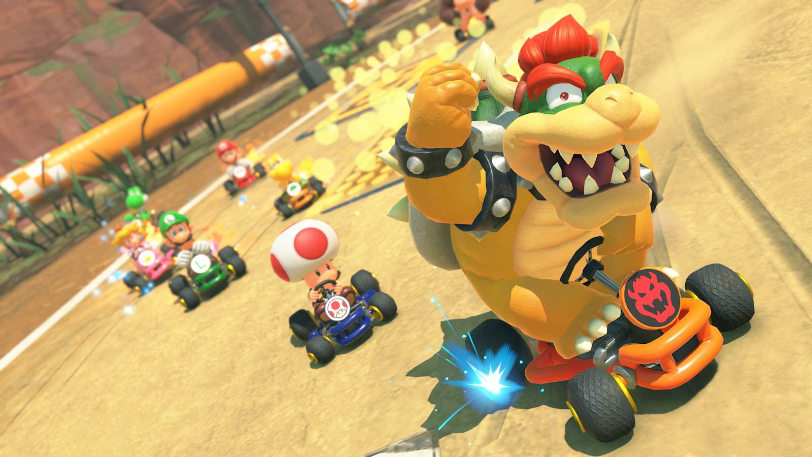 Bowser ดริฟต์นำกลุ่มนักแข่งในสนาม Choco Island ของ Mario Kart World