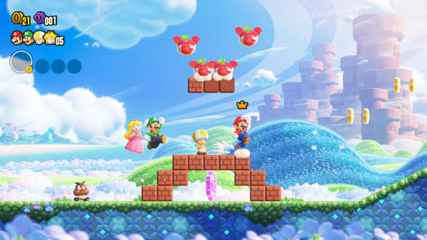 Se muestra a Luigi, Peach, un Toad amarillo y Mario corriendo a través de un nivel en el modo multijugador. 